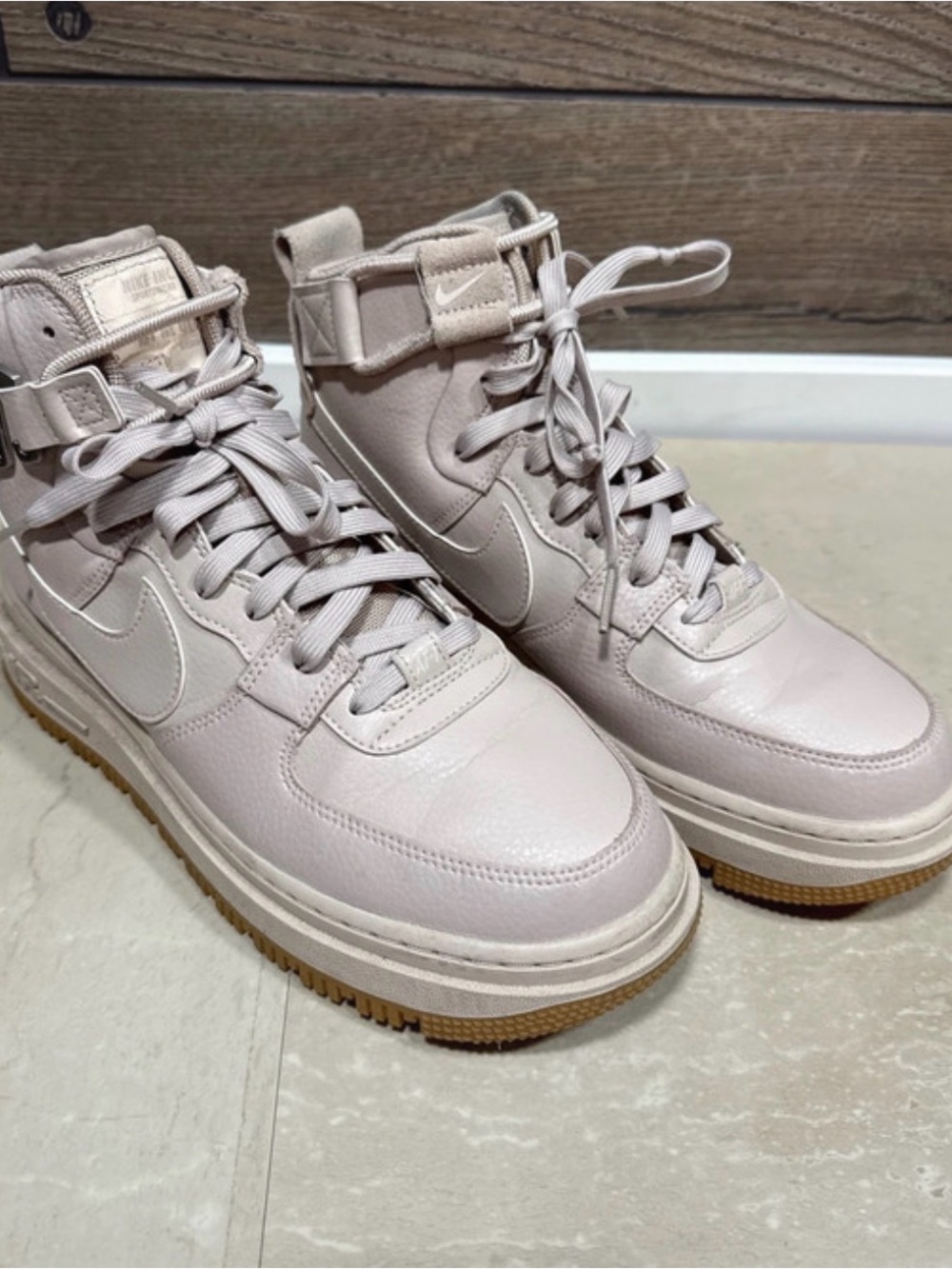 Nike Women’s High-Top Sneakers in Pale Blush